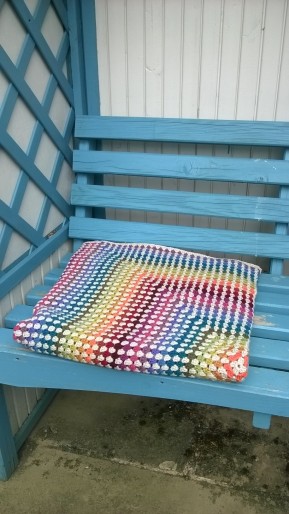 folded blanket on seat